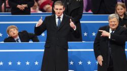 WASHINGTON, DC - JANUARY 20: Baron Trump (L) and Viktor Knavs attend an indoor inauguration parade at Capital One Arena on January 20, 2025 in Washington, DC. Donald Trump takes office for his second term as the 47th president of the United States. (Photo by Christopher Furlong/Getty Images)