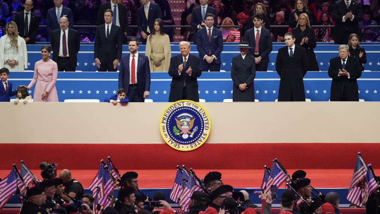 WASHINGTON, DC - JANUARY 20: (L-R) Second lady Usha Vance and her children, U.S. Vice President J.D. Vance, U.S. President Donald Trump, first lady Melania Trump, Barron Trump, and father of Melania Trump Viktor Knavs look on during an indoor inauguration parade at Capital One Arena on January 20, 2025 in Washington, DC. Donald Trump takes office for his second term as the 47th president of the United States. (Photo by Christopher Furlong/Getty Images)