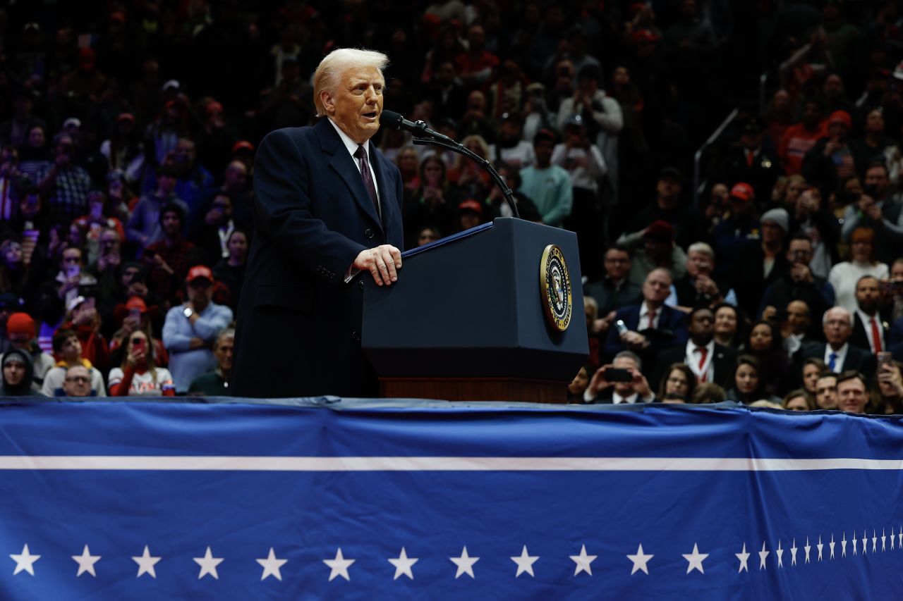 US President Donald Trump speaks during an indoor inauguration parade at Capital One Arena on Monday.