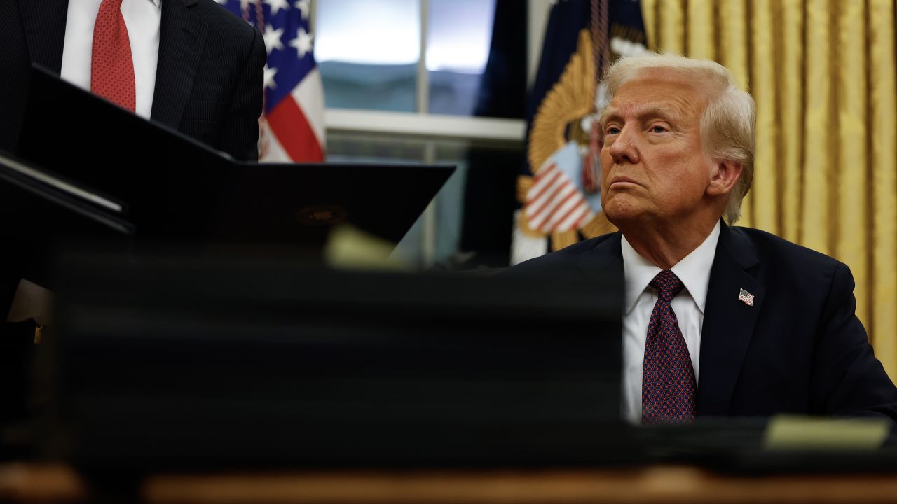 President Donald Trump signs executive orders in the Oval Office on January 20, 2025 in Washington, DC. Trump takes office for his second term as the 47th president of the United States.