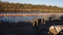 US Army soldiers patrol the US-Mexico border at Eagle Pass, Texas.