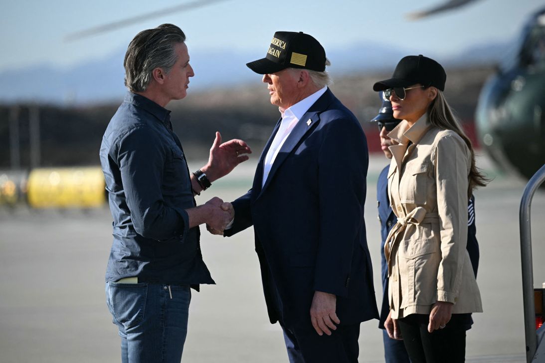 President Donald Trump, followed by first lady Melania Trump, shakes hands with California Gov. Gavin Newsom after arriving at Los Angeles International Airport in Los Angeles on January 24 to visit the region devastated by the Palisades and Eaton fires.