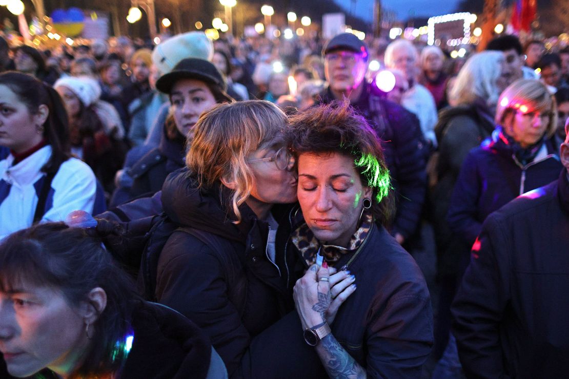 Two participants holding the lights of the mobile phone on January 25, 2025 in Berlin, Germany, and the participants holding the lights of the mobile phone.