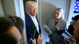 US President Donald Trump speaks with the press, alongside White House Press Secretary Karoline Leavitt (R), on board Air Force One after departing Las Vegas, Nevada, en route to Miami, Florida on January 25, 2025. After visits to disaster sites in North Carolina and California, the Vegas stop is more of a feel-good victory lap, as he lays out his plans to exclude tips from federal taxes -- an enormously popular move in a city built on the hospitality industry. (Photo by Mandel NGAN / AFP) (Photo by MANDEL NGAN/AFP via Getty Images)