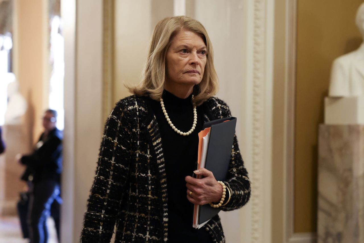 Lisa Murkowski heads to the Senate Chamber in Washington, DC., on January 22.