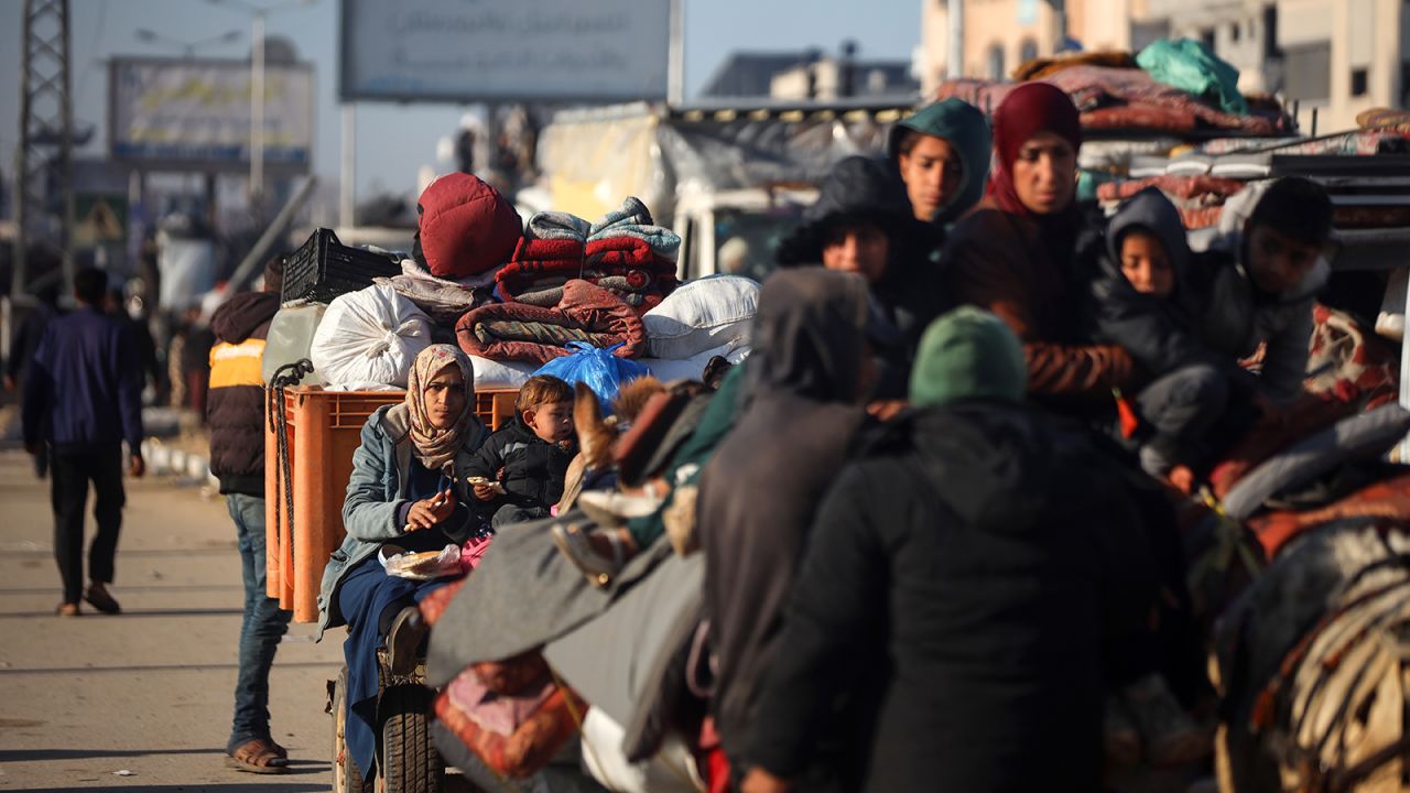 Displaced Palestinians wait in central Gaza to be allowed to return to their homes in the north on January 26, 2025.