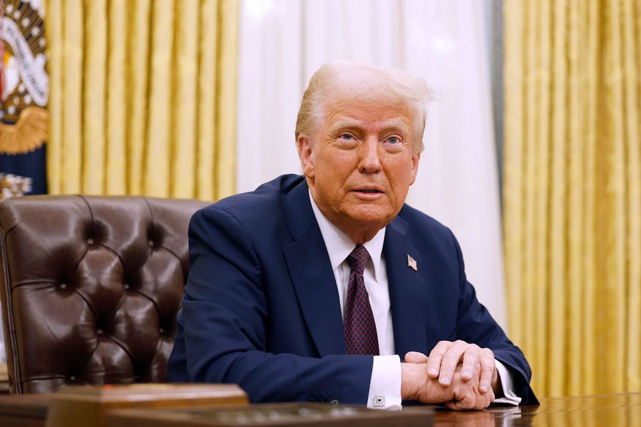 President Donald Trump speaks to reporters in the Oval Office on Thursday.