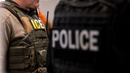 US Immigration and Customs Enforcement (ICE) agents, along with other federal law enforcement agencies, attend a pre-enforcement meeting in Chicago, Illinois, US, on Sunday, Jan. 26, 2025. President Donald Trump has pledged to carry out the largest deportation effort in US history, vowing to ultimately deport all of the foreigners living in the country without permission. Photographer: Christopher Dilts/Bloomberg via Getty Images
