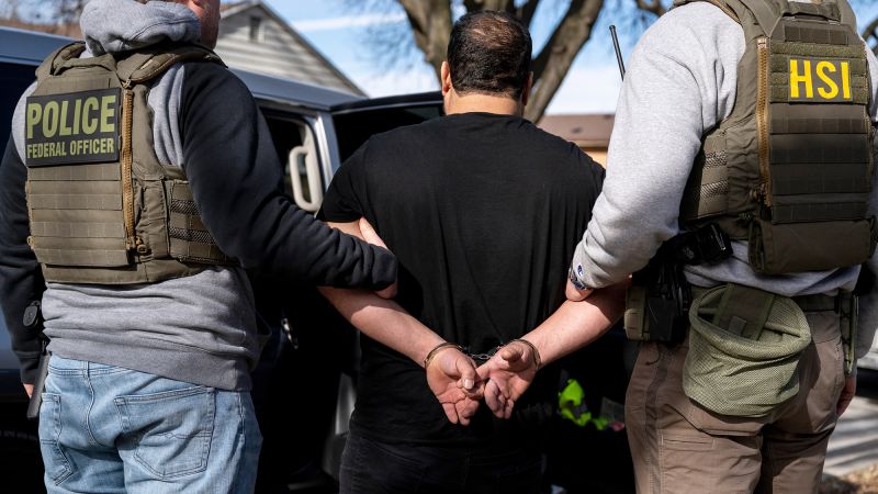 Federal agents in immigration raids told to be camera-ready as hundreds arrested