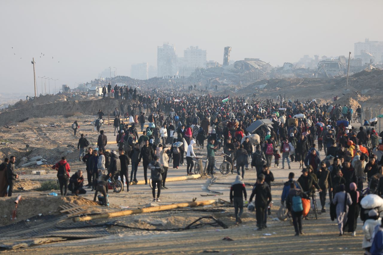 GAZA CITY, GAZA - JANUARY 27: A view of the crowd as forcibly displaced Palestinians return to their homes in the North on foot through coastal Al-Rashid street in Gaza City, Gaza on January 27, 2025. (Photo by Dawoud Abo Alkas/Anadolu via Getty Images)