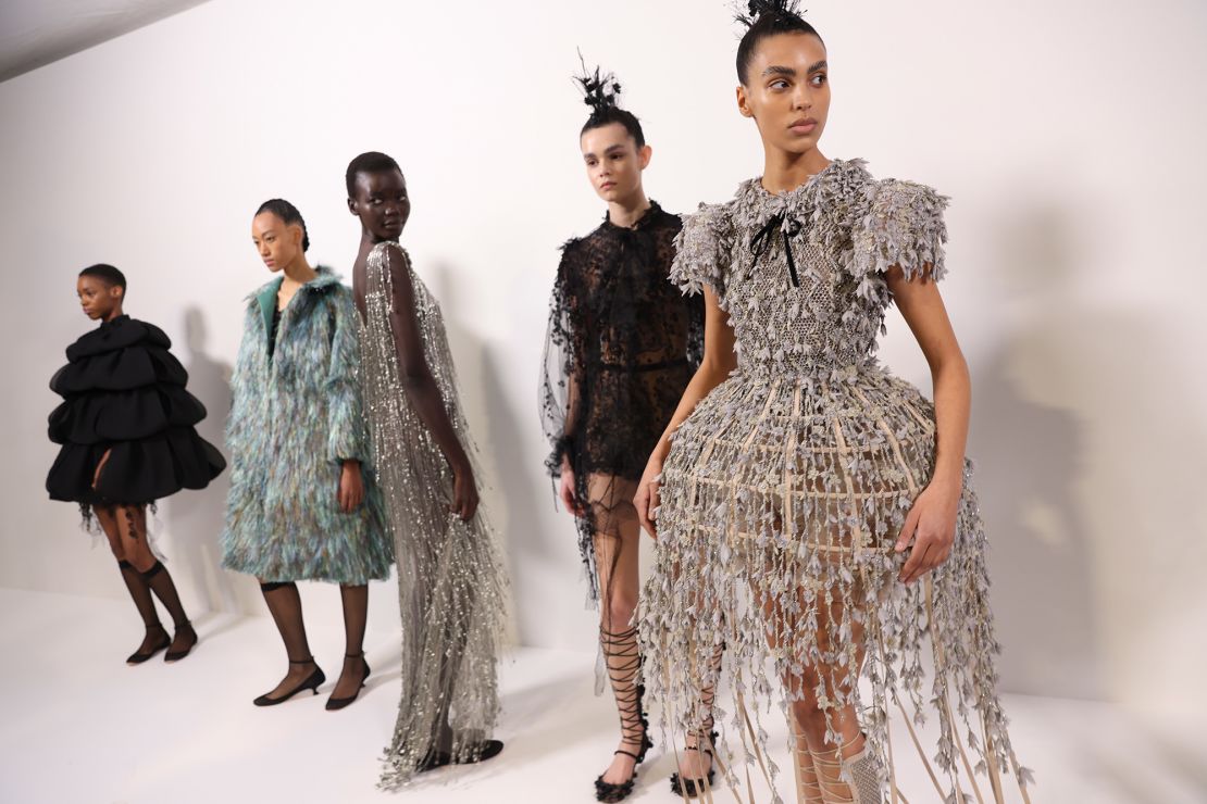 Dior models wore crinoline styles in raffia and lace, while others had embroidered butterflies and dragonflies that looked like a wearable garden.