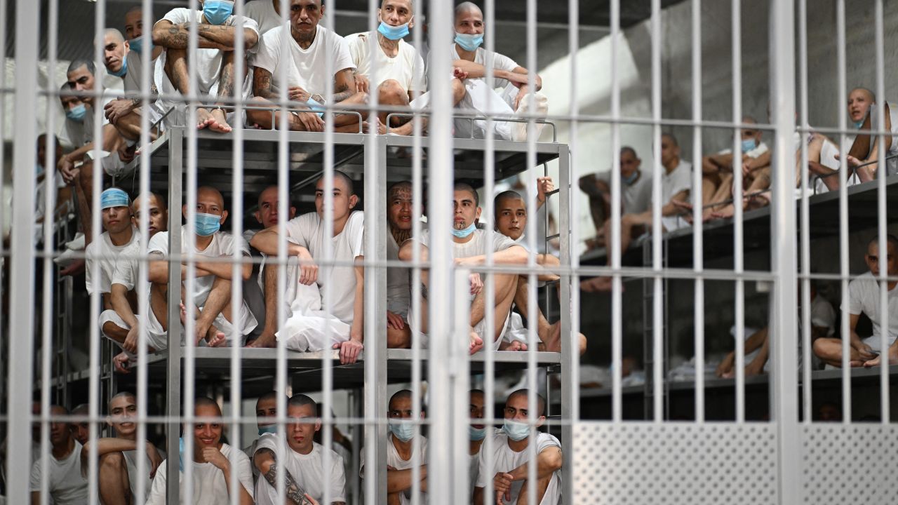 Inmates look on as they remain in a cell at the Counter-Terrorism Confinement Centre (CECOT) mega-prison, where hundreds of  of the MS-13 and 18 Street gangs are being held, in Tecoluca, El Salvador on January 27, 2025. The CECOT, the largest prison in Latin America and emblem of the war against gangs of the government of President Nayib Bukele, celebrates two years since it was inaugurated on February 1. (Photo by Marvin RECINOS / AFP) (Photo by MARVIN RECINOS/AFP via Getty Images)
