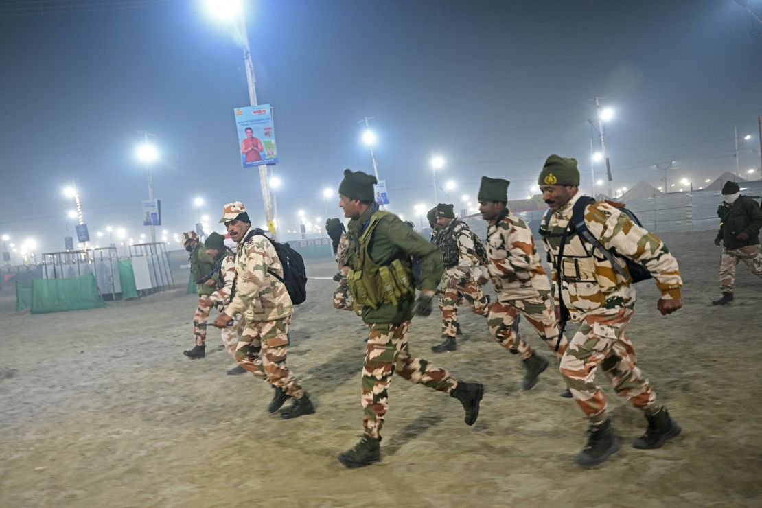 Security personnel at the site of the crowd crush in Prayagraj.