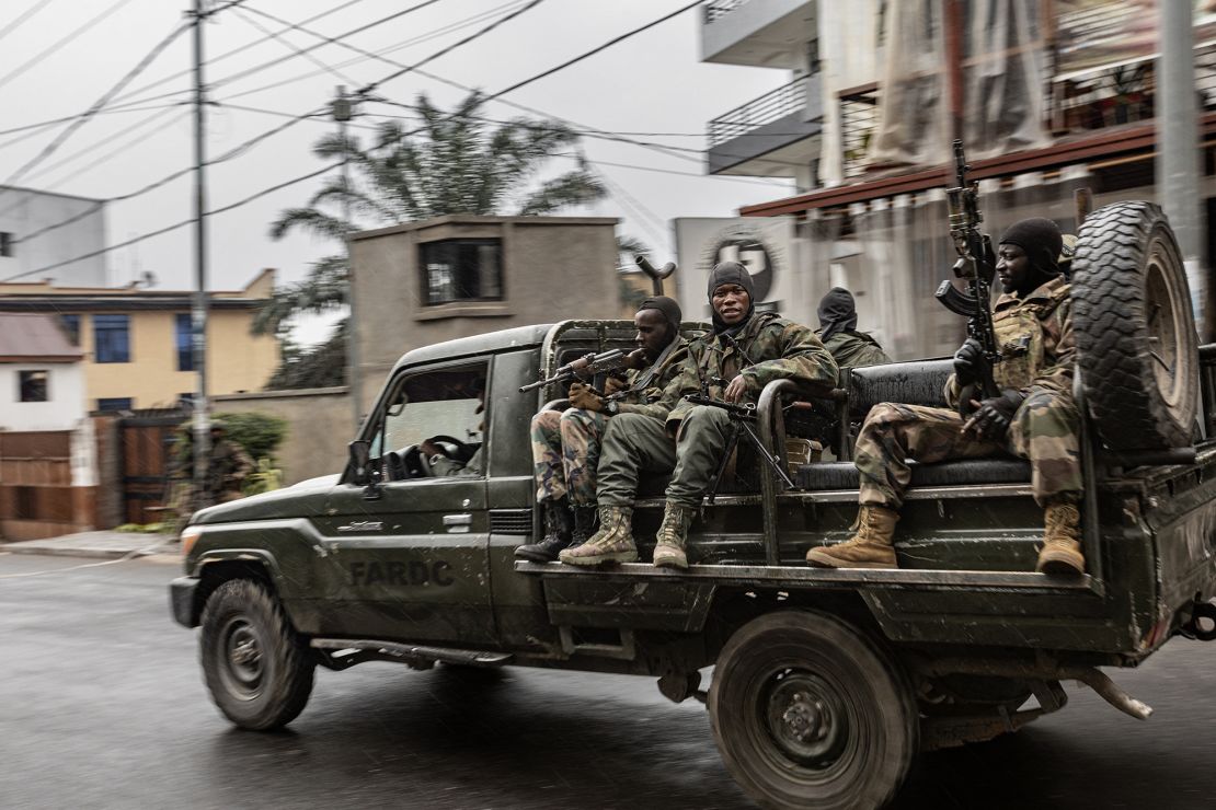 Members of the M23 armed group ride in a vehicle formerly belonging to the Armed Forces of the Democratic Republic of Congo (FARDC) while patrolling a street in Goma on January 29, 2025.