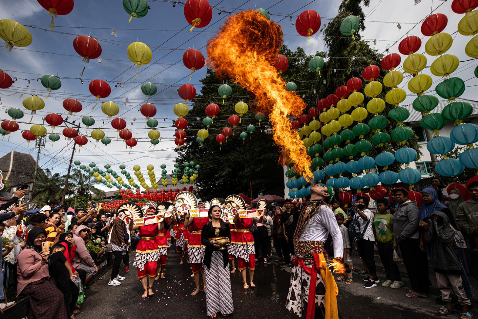 Participants perform during the Grebeg Sudiro festival in Solo, Indonesia, as a prelude to the Lunar New Year on Sunday.