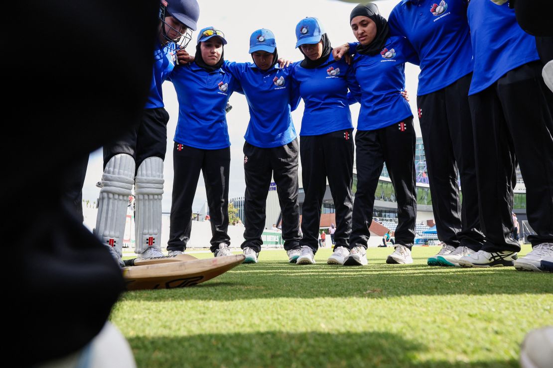 Cricketers from Afghanistan huddle before a match in Melbourne, Australia, on January 30.