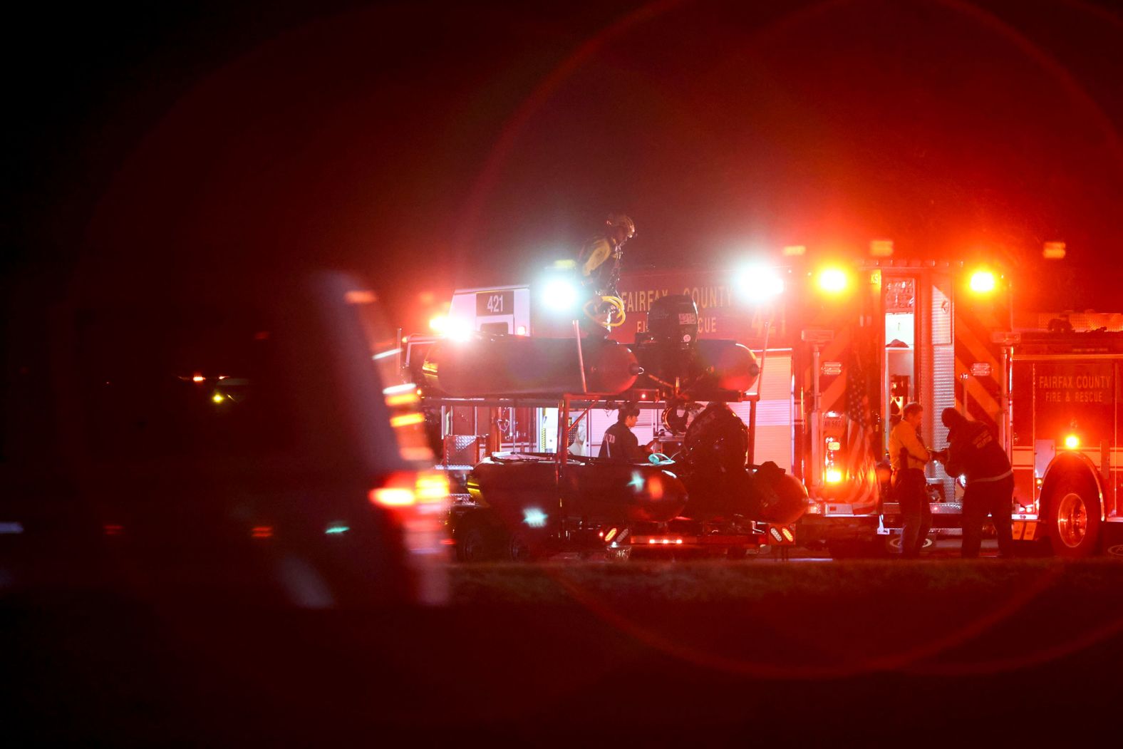 Emergency crews respond to the wreckage site on Wednesday, January 29.