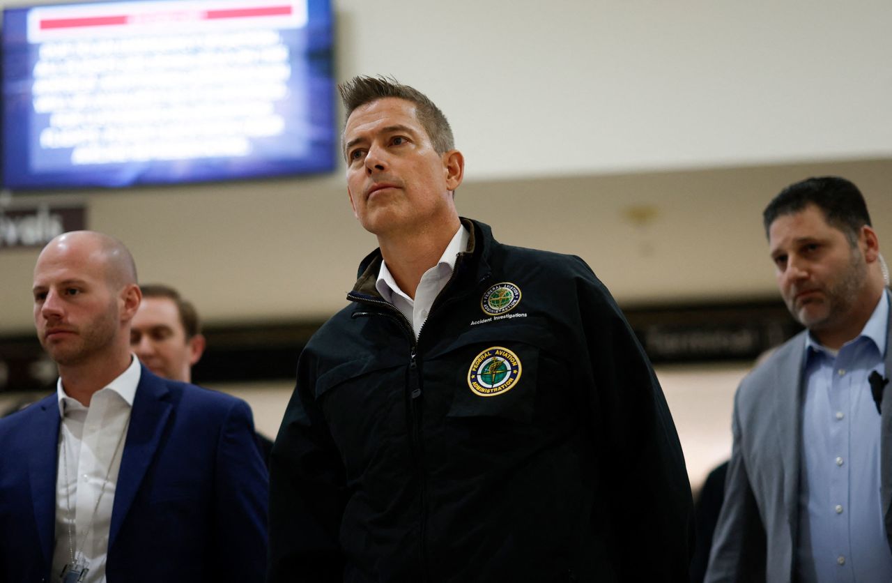 Secretary of Transportation Sean Duffy listens during a media briefing at Reagan National Airport on Thursday.