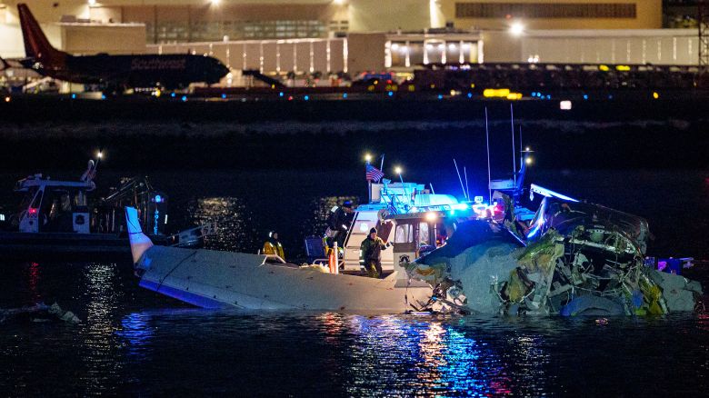 ARLINGTON, VIRGINIA - JANUARY 30: (EDITORS NOTE: Image contains graphic content) Emergency response units assess airplane wreckage in the Potomac River near Ronald Reagan Washington Airport on January 30, 2025 in Arlington, Virginia. An American Airlines flight from Wichita, Kansas collided with a helicopter while approaching Ronald Reagan National Airport. (Photo by Andrew Harnik/Getty Images)