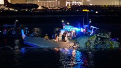 ARLINGTON, VIRGINIA - JANUARY 30: (EDITORS NOTE: Image contains graphic content) Emergency response units assess airplane wreckage in the Potomac River near Ronald Reagan Washington Airport on January 30, 2025 in Arlington, Virginia. An American Airlines flight from Wichita, Kansas collided with a helicopter while approaching Ronald Reagan National Airport. (Photo by Andrew Harnik/Getty Images)