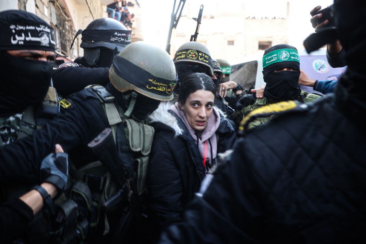 Palestinian militant group Islamic Jihad escort Arbel Yehoud to hand her over to a Red Cross team Khan Younis on Thursday.