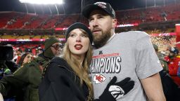KANSAS CITY, MISSOURI - JANUARY 26: Taylor Swift celebrates with Travis Kelce #87 of the Kansas City Chiefs after defeating the Buffalo Bills 32-29 in the AFC Championship Game at GEHA Field at Arrowhead Stadium on January 26, 2025 in Kansas City, Missouri.  (Photo by David Eulitt/Getty Images)