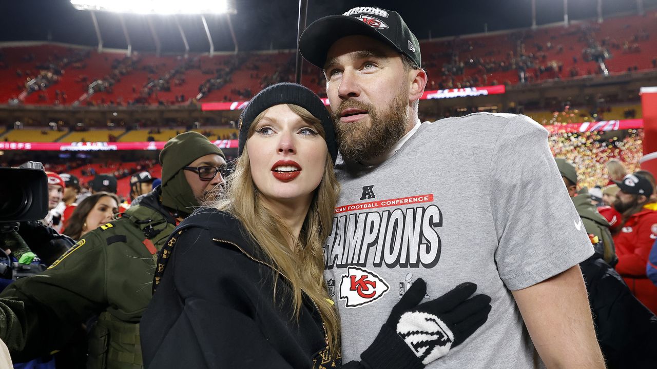 Taylor Swift celebrates with Travis Kelce #87 of the Kansas City Chiefs after defeating the Buffalo Bills 32-29 in the AFC Championship Game at GEHA Field at Arrowhead Stadium on January 26, 2025 in Kansas City, Missouri.