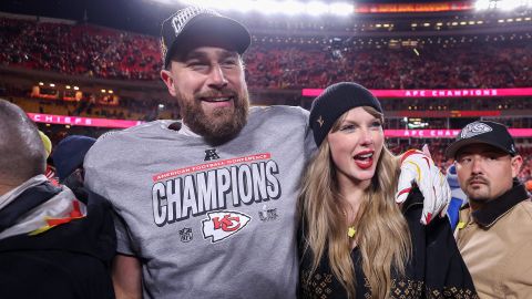 Taylor Swift celebrates with Travis Kelce #87 of the Kansas City Chiefs after defeating the Buffalo Bills 32-29 in the AFC Championship Game at GEHA Field at Arrowhead Stadium on January 26, 2025 in Kansas City, Missouri.