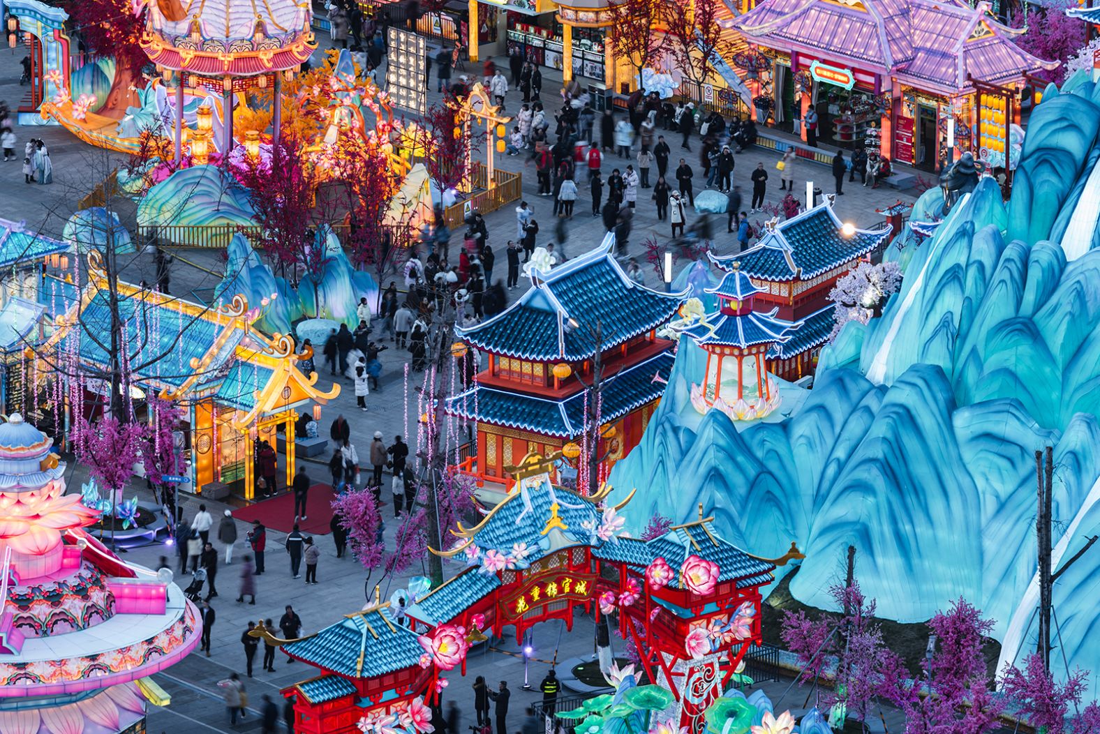 People enjoy lantern displays at a tourist attraction in Chengdu, China, organized to celebrate the Spring Festival, on Sunday.