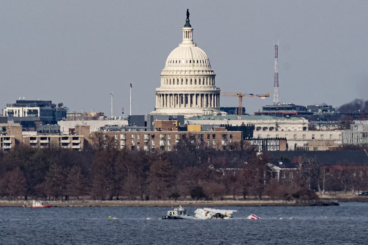 ARLINGTON, VIRGINIA - JANUARY 30: Emergency response units work at the crash site of the American Airlines plane on the Potomac River after the plane crashed last night on approach to Reagan National Airport on January 30, 2025 in Arlington, Virginia. The American Airlines flight from Wichita, Kansas collided in midair with a military helicopter while approaching the airport. According to reports there were no survivors amongst the 67 people on board both aircraft. (Photo by Al Drago/Getty Images)