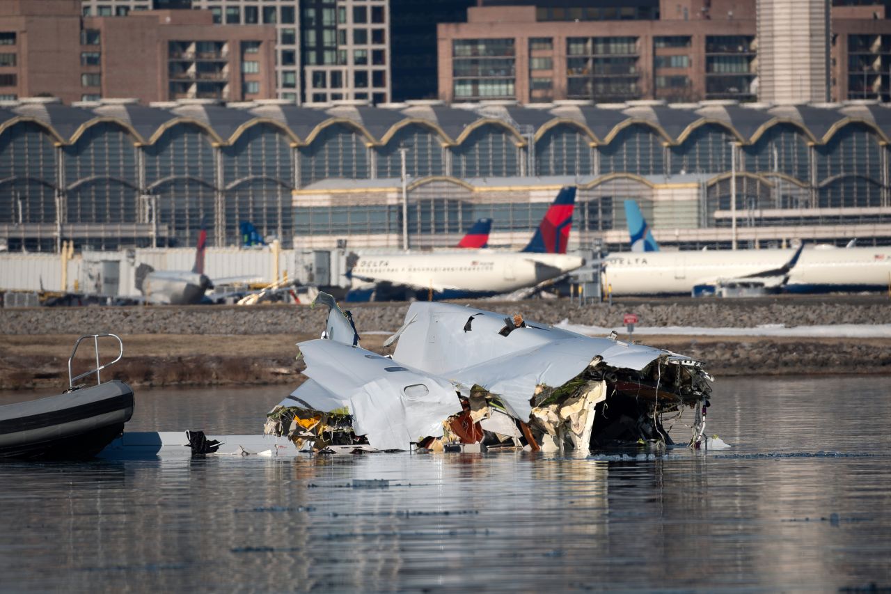 Wreckage is seen in the Potomac River on Thursday.