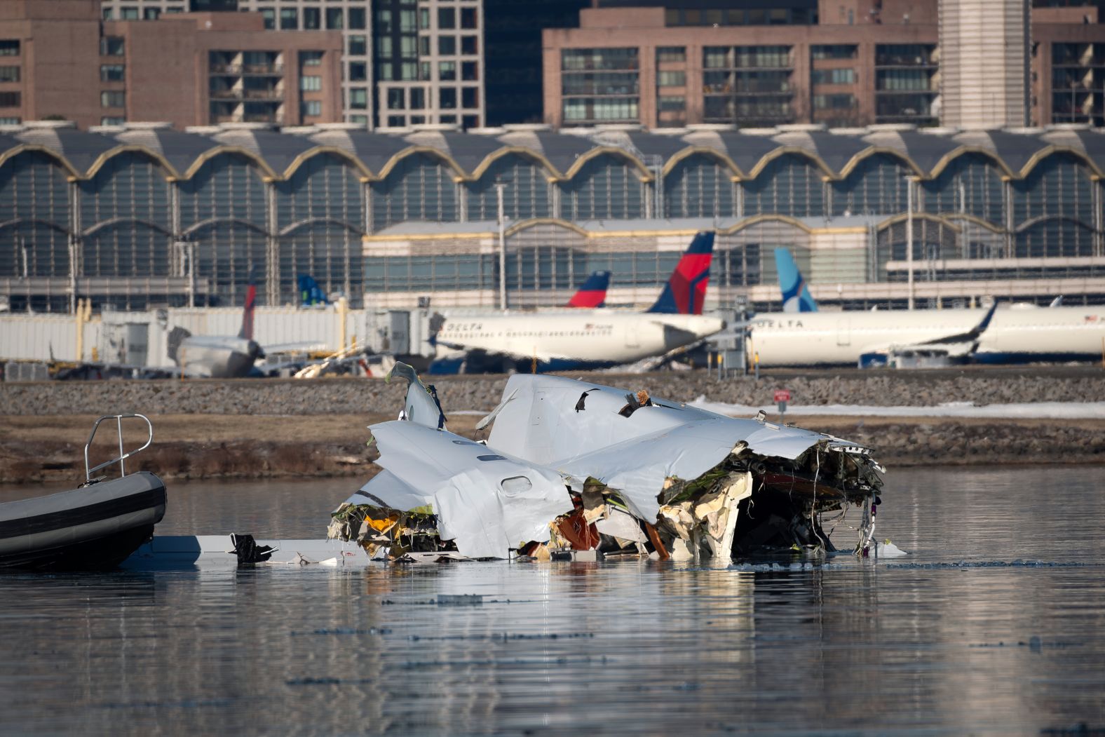 Wreckage is seen in the Potomac on Thursday.