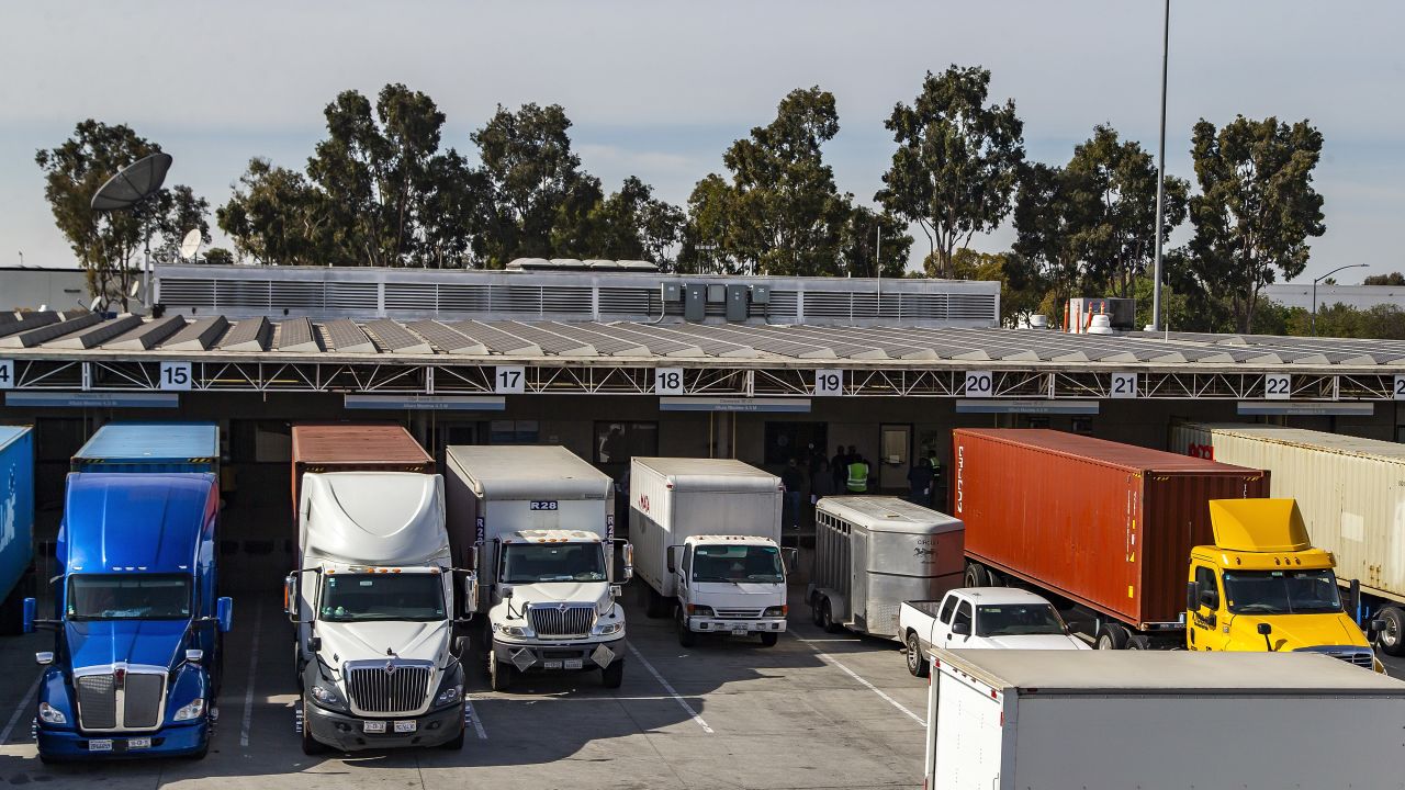 SAN DIEGO, CALIFORNIA - JANUARY 31: Cargo vehicles line up at checkpoint to enter to Mexico on January 31, 2025 in San Diego, California. President Donald Trump announced and increase of 25% in tariffs for products from Mexico which, according to him, is a response to the large amount of undocumented migrants crossing from the border with no control. (Photo by Francisco Vega/Getty Images)