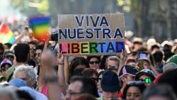 A demonstrator holds a sing that reads in spanish 'Long live our freedom' during a national march called by women and LGBTQ pride groups in repudiation of President Javier Milei's remarks in Davos on feminism and the LGBT community, in Buenos Aires on February 1st, 2025. Political, trade union and civil society sectors march against the advance of Milei's government on diversity policies. During his first year in office, Milei had dissolved the Ministry of Women, Gender and Diversity, as well as the National Institute Against Discrimination, Xenophobia and Racism. (Photo by LUIS ROBAYO / AFP) (Photo by LUIS ROBAYO/AFP via Getty Images)          