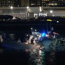 ARLINGTON, VIRGINIA - JANUARY 30: (EDITORS NOTE: Image contains graphic content) Emergency response units assess airplane wreckage in the Potomac River near Ronald Reagan Washington Airport on January 30, 2025 in Arlington, Virginia. An American Airlines flight from Wichita, Kansas collided with a helicopter while approaching Ronald Reagan National Airport. (Photo by Andrew Harnik/Getty Images)