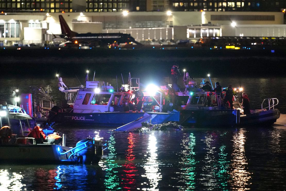 Emergency units work in the Potomac River early Thursday morning.