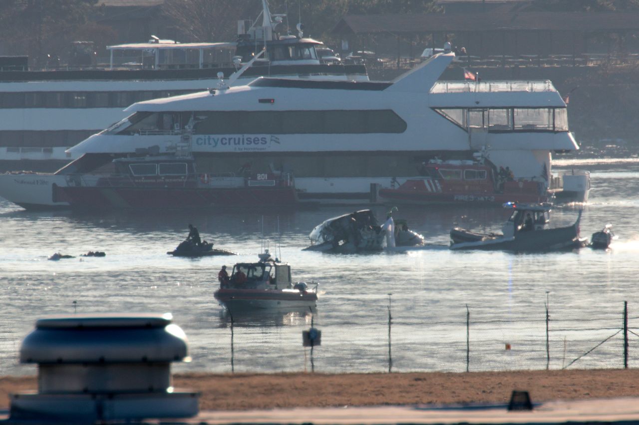 Emergency response units search the crash site of the American Airlines plane on the Potomac River on Thursday in Arlington, Virginia.