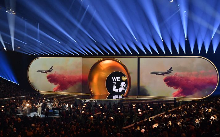 Indie rock band Dawes — whose two frontmen, brothers Taylor and Griffin Goldsmith, both lost their homes in the Eaton Fire — <a  target="_top" href="/newspapers?url=https://www.cnn.com/entertainment/live-news/the-grammys-award-show-02-2-25#cm6o8gioj00003b6mrrud9d28">were joined by a star-studded group</a> as they kicked off the show with a lively rendition of Randy Newman’s 1983 classic “I Love LA.” Performing with Dawes were John Legend, Sheryl Crow, Brad Paisley, Brittany Howard and St. Vincent.