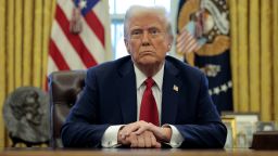President Donald Trump speaks to reporters at the White House in Washington, DC, on January 30.