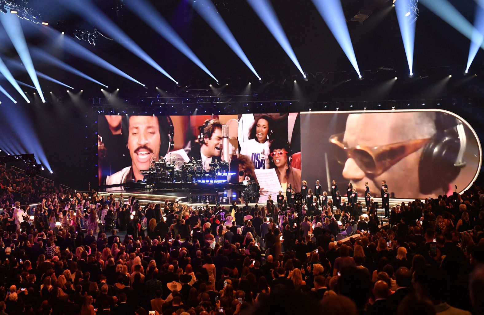 The crowd watches Stevie Wonder and Herbie Hancock perform on stage during the Quincy Jones tribute.