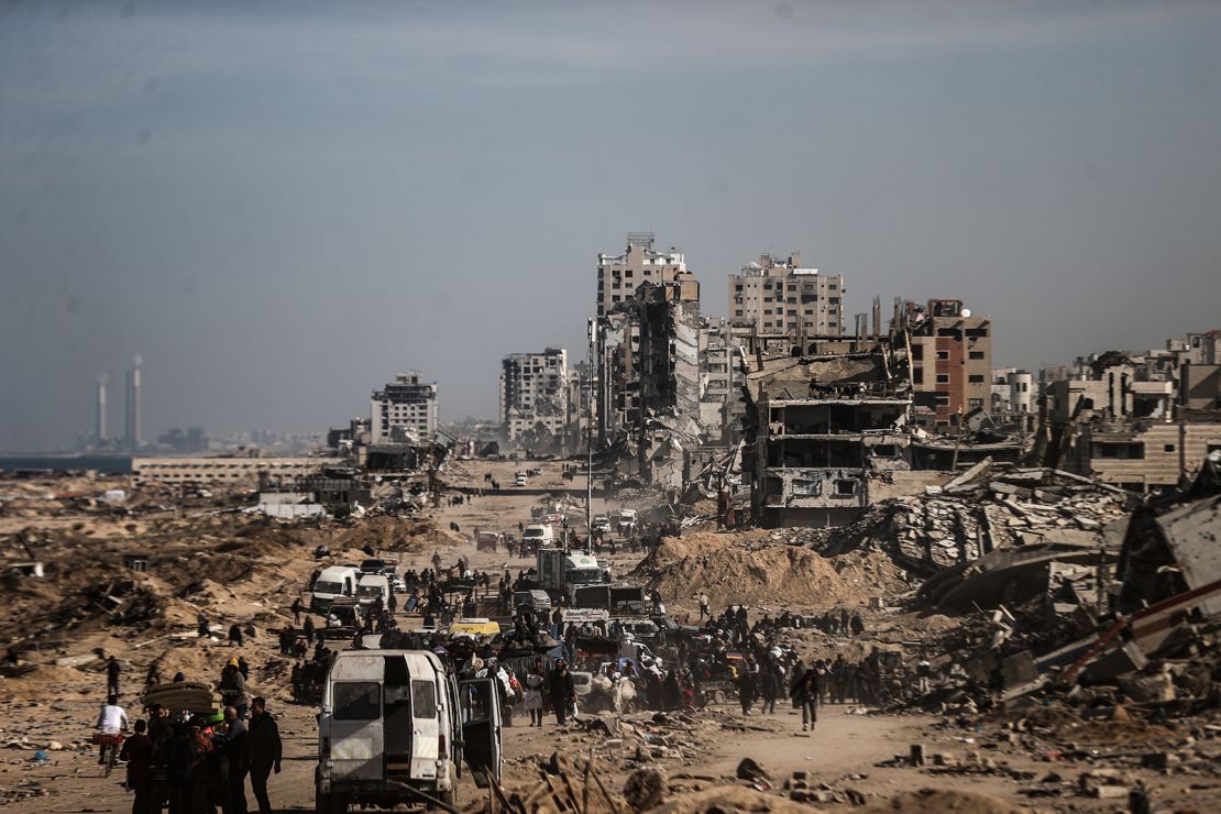 Palestinians return home after a ceasefire agreement between Israel and Hamas, amid destruction in Gaza City, Gaza on February 2, 2025.