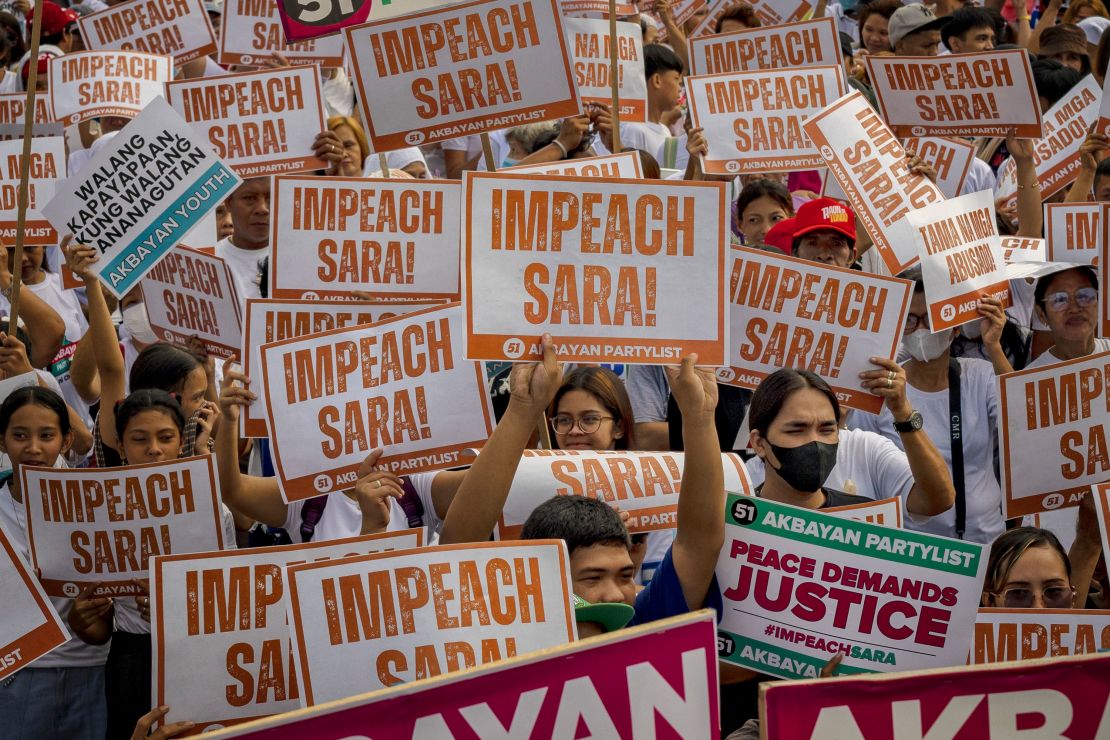 Demonstrators take part in a protest in Manila, calling for the impeachment of Vice President Sara Duterte.