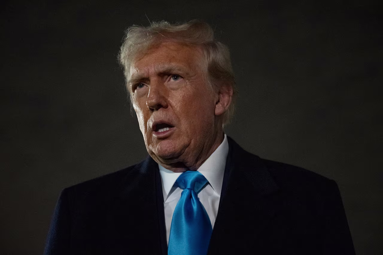 US President Donald Trump speaks to the press upon arrival at Joint Base Andrews in Maryland on February 2, as he returns to the White House from Florida.