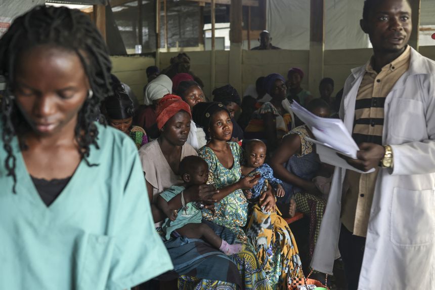 People attend a clinic run by Doctors Without Borders (MSF) at Lushagala camp for internally displaced persons in the city of Goma on February 3, 2025.