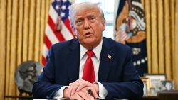TOPSHOT - US President Donald Trump speaks to the press as he signs an executive order to create a US sovereign wealth fund, in the Oval Office of the White House on February 3, 2025, in Washington, DC. (Photo by Jim WATSON / AFP) (Photo by JIM WATSON/AFP via Getty Images)          