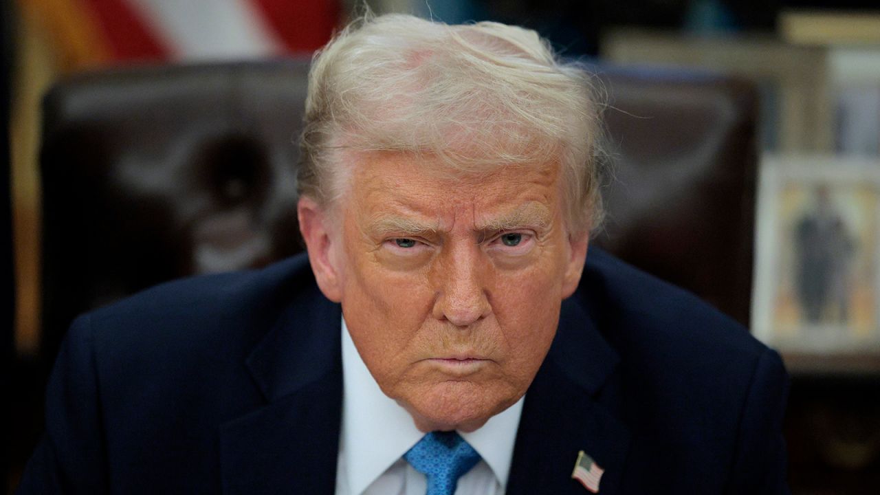 U.S. President Donald Trump talks to reporters after signing an executive order, "Unleashing prosperity through deregulation," in the Oval Office on January 31, 2025 in Washington, DC.