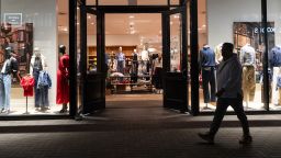 A shopper walks by a J. Crew store at the Westfield UTC shopping center on January 31, 2025 in San Diego.