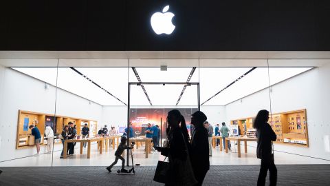 People walk by an Apple store at the Westfield UTC shopping center on January 31, 2025 in San Diego, California.