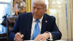 US President Donald Trump signs an executive order withdrawing his country from a number of United Nations bodies in the Oval Office of the White House on February 4, 2025 in Washington, DC. Trump on Tuesday signed an executive order withdrawing his country from a number of United Nations bodies, including its Human Rights Council (UNHRC), and setting up a broader review of US funding for the multilateral organization. The executive order said it withdrew Washington from UNHRC and the main UN relief agency for Palestinians (UNRWA), and would review involvement in the United Nations Educational, Scientific and Cultural Organization (UNESCO). (Photo by ANDREW CABALLERO-REYNOLDS / AFP) (Photo by ANDREW CABALLERO-REYNOLDS/AFP via Getty Images) 