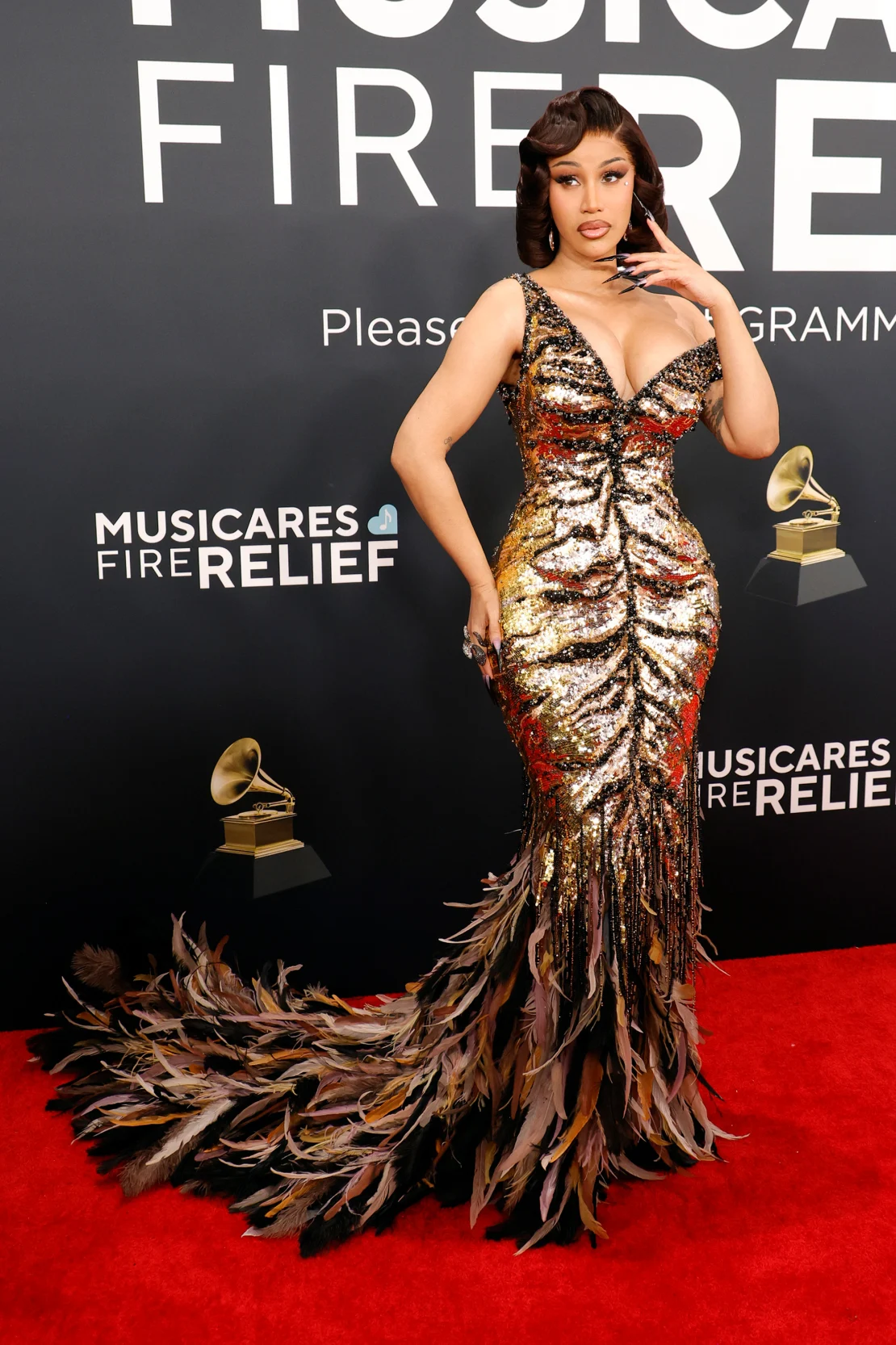 Cardi B’s hand-embroidered Cavalli Couture gown turned into an autumnal plume as it trailed to the floor. Frazer Harrison/Getty Images